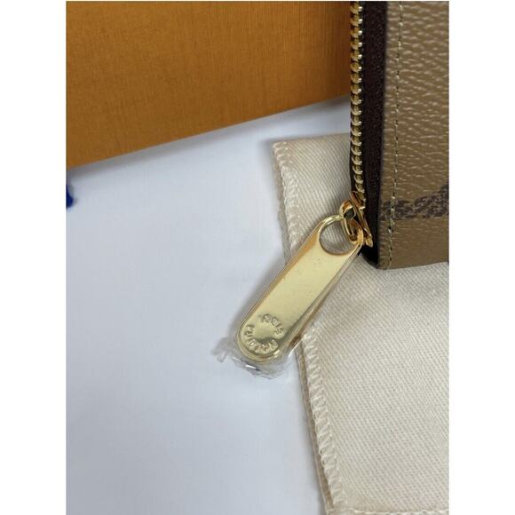 Louis Vuitton Zippy Wallet Reverse Monogram Giant Brown - Picture 10 of 12